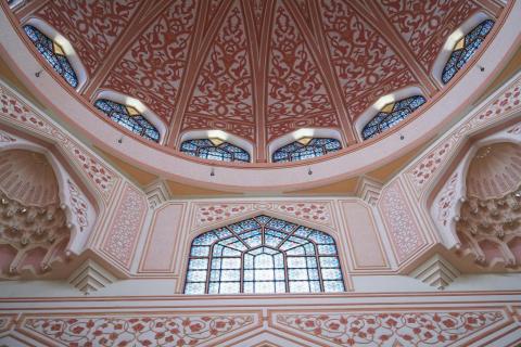Religious building ceiling with stained glass